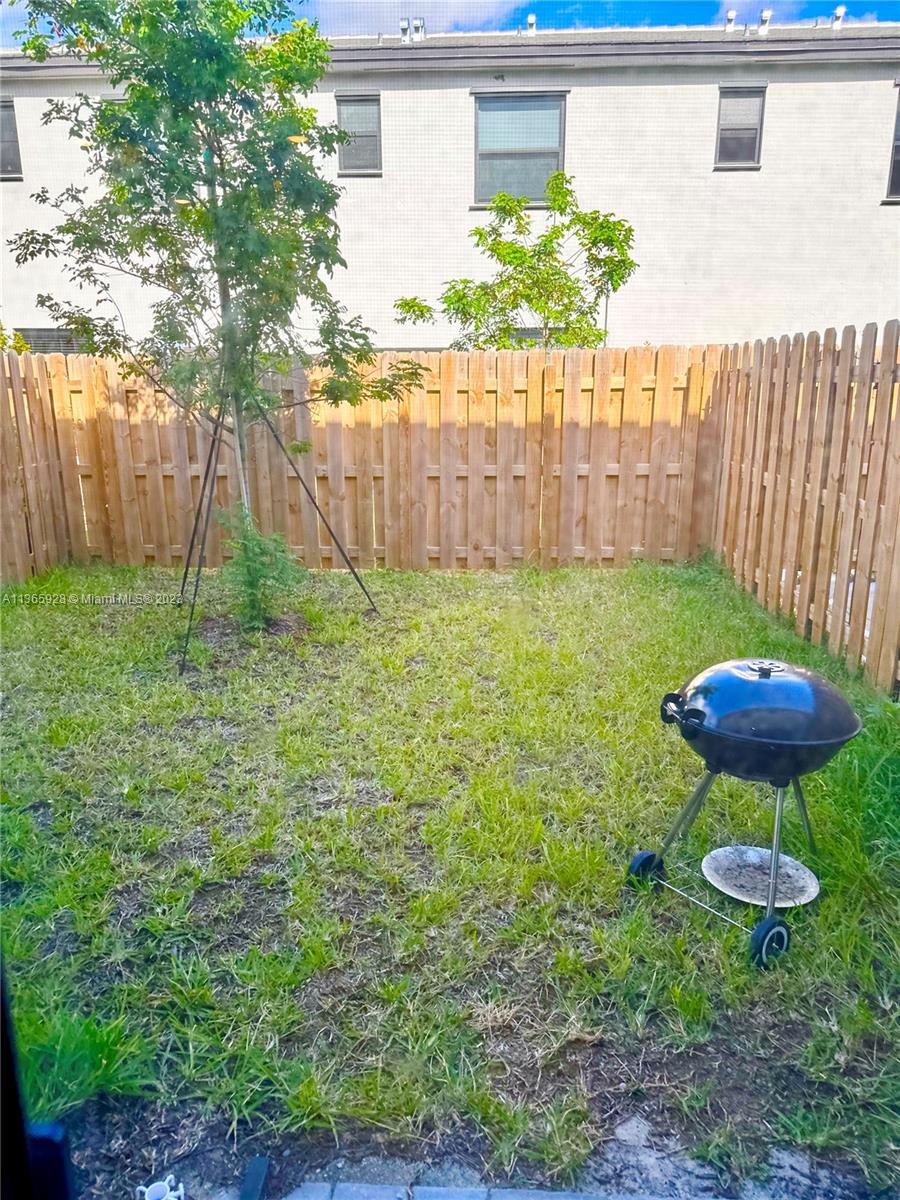 28661 Southwest 132nd Place Homestead, FL 33033 - Photo 11 of 22 a view of a backyard with a garden