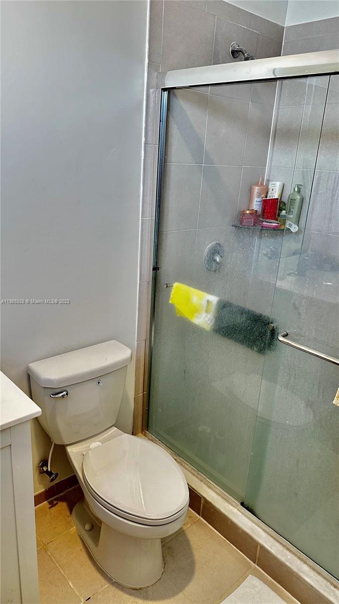 28661 Southwest 132nd Place Homestead, FL 33033 - Photo 20 of 22 a bathroom with a toilet and a shower