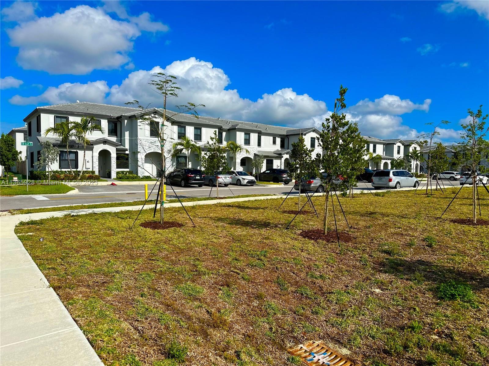 28661 Southwest 132nd Place Homestead, FL 33033 - Photo 22 of 22 a view of a swimming pool with an outdoor space