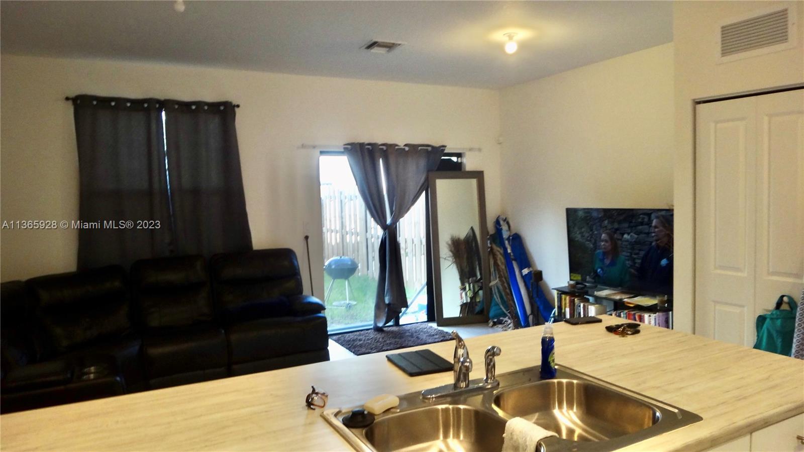 28661 Southwest 132nd Place Homestead, FL 33033 - Photo 8 of 22 a view of a living room with furniture and a couch