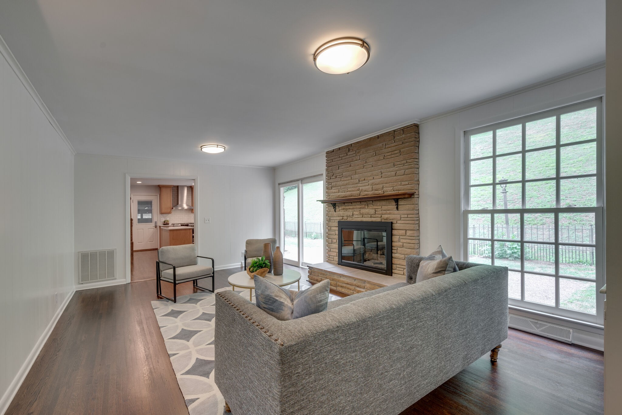 6612 Ellesmere Road Nashville, TN 37205 - Photo 15 of 34 a living room with furniture and a fireplace