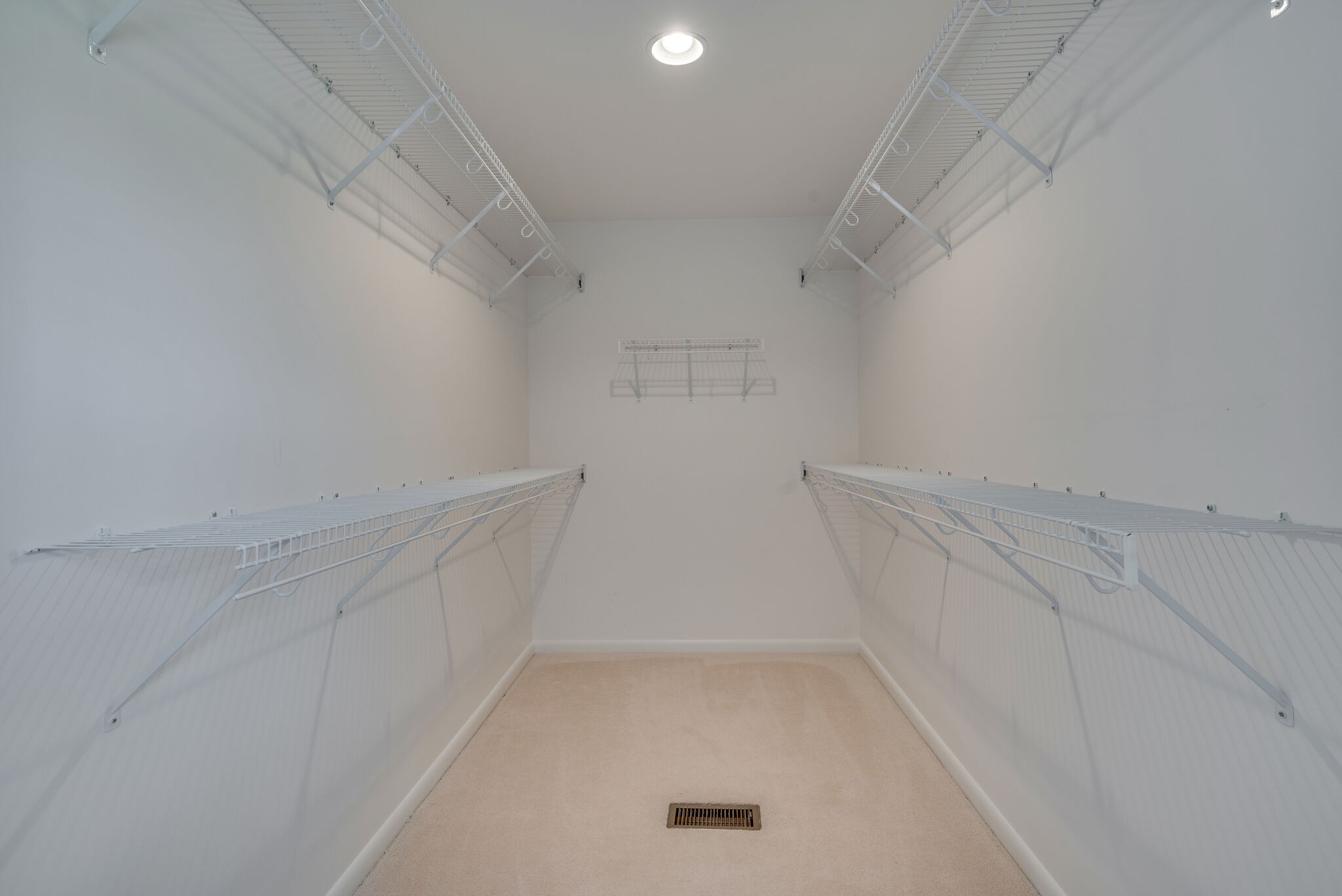 6612 Ellesmere Road Nashville, TN 37205 - Photo 19 of 34 a view of storage and utility room with empty racks