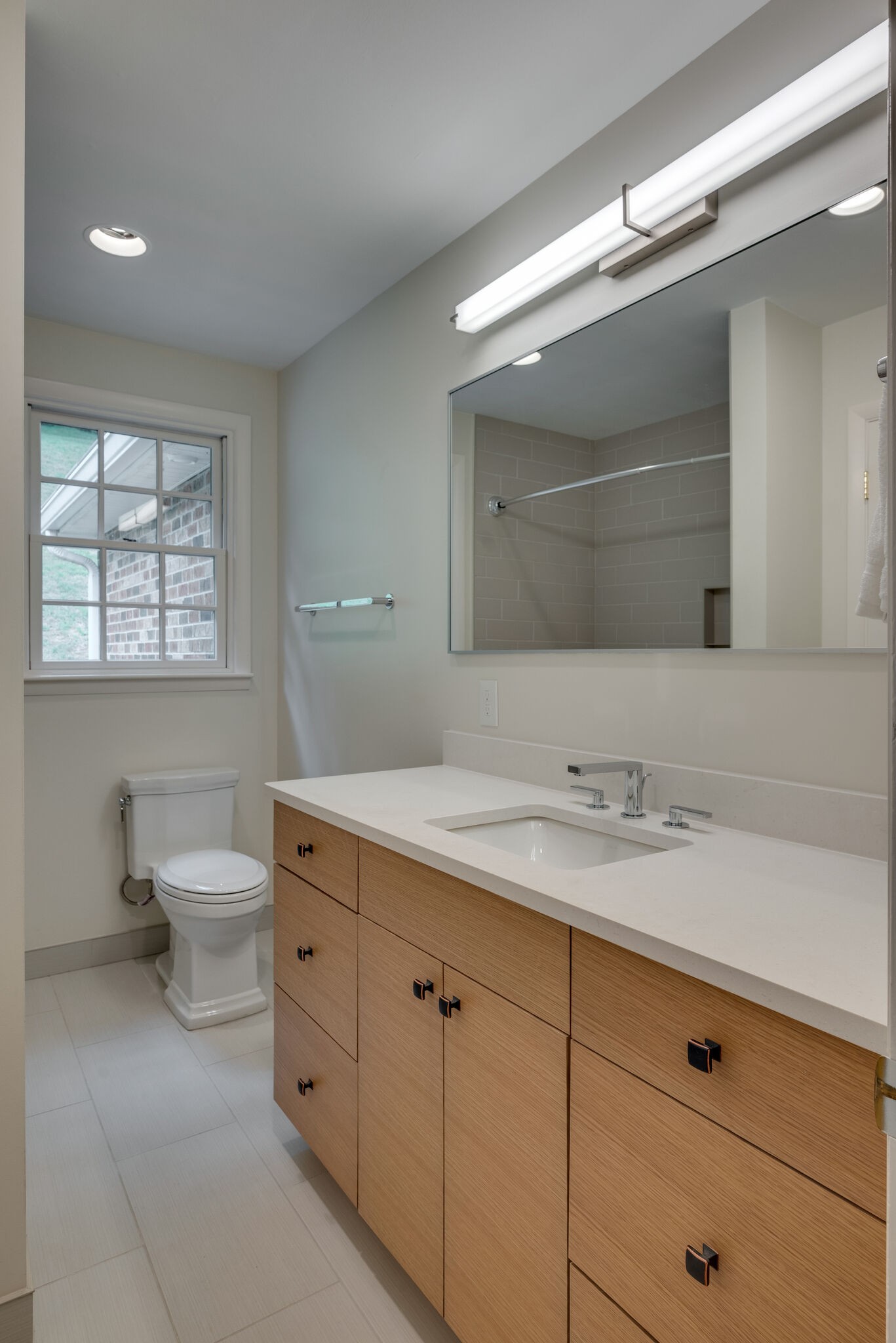6612 Ellesmere Road Nashville, TN 37205 - Photo 23 of 34 a bathroom with a granite countertop toilet sink and mirror