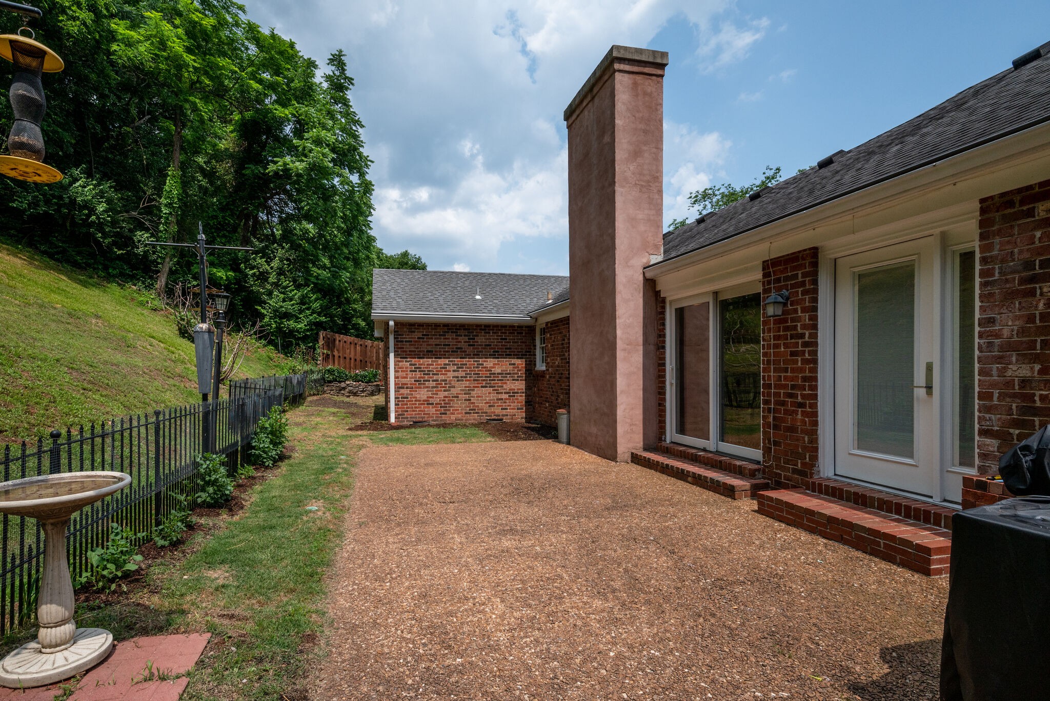 6612 Ellesmere Road Nashville, TN 37205 - Photo 30 of 34 a front view of a house with garden and trees