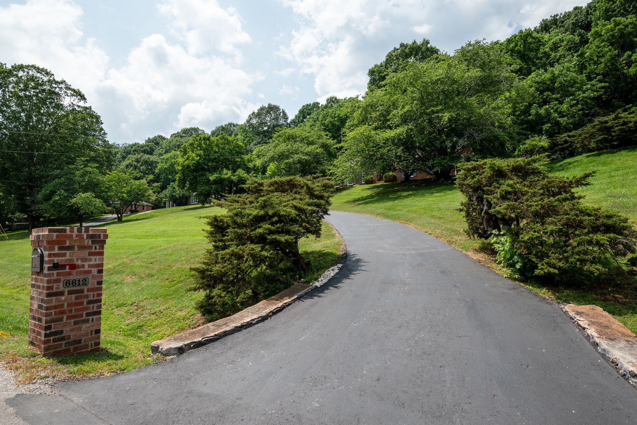 6612 Ellesmere Road Nashville, TN 37205 - Photo 34 of 34 a view of a garden with an empty space
