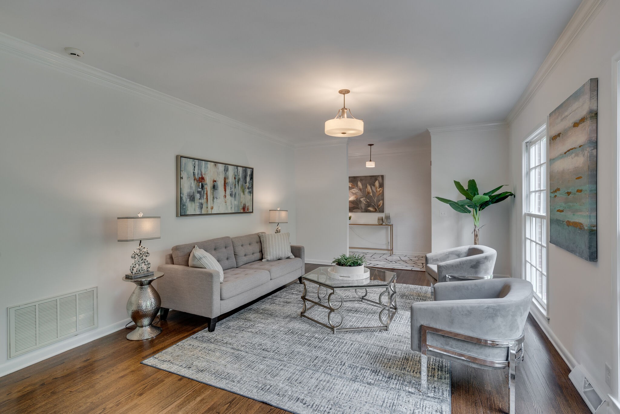 6612 Ellesmere Road Nashville, TN 37205 - Photo 7 of 34 a living room with furniture and a potted plant