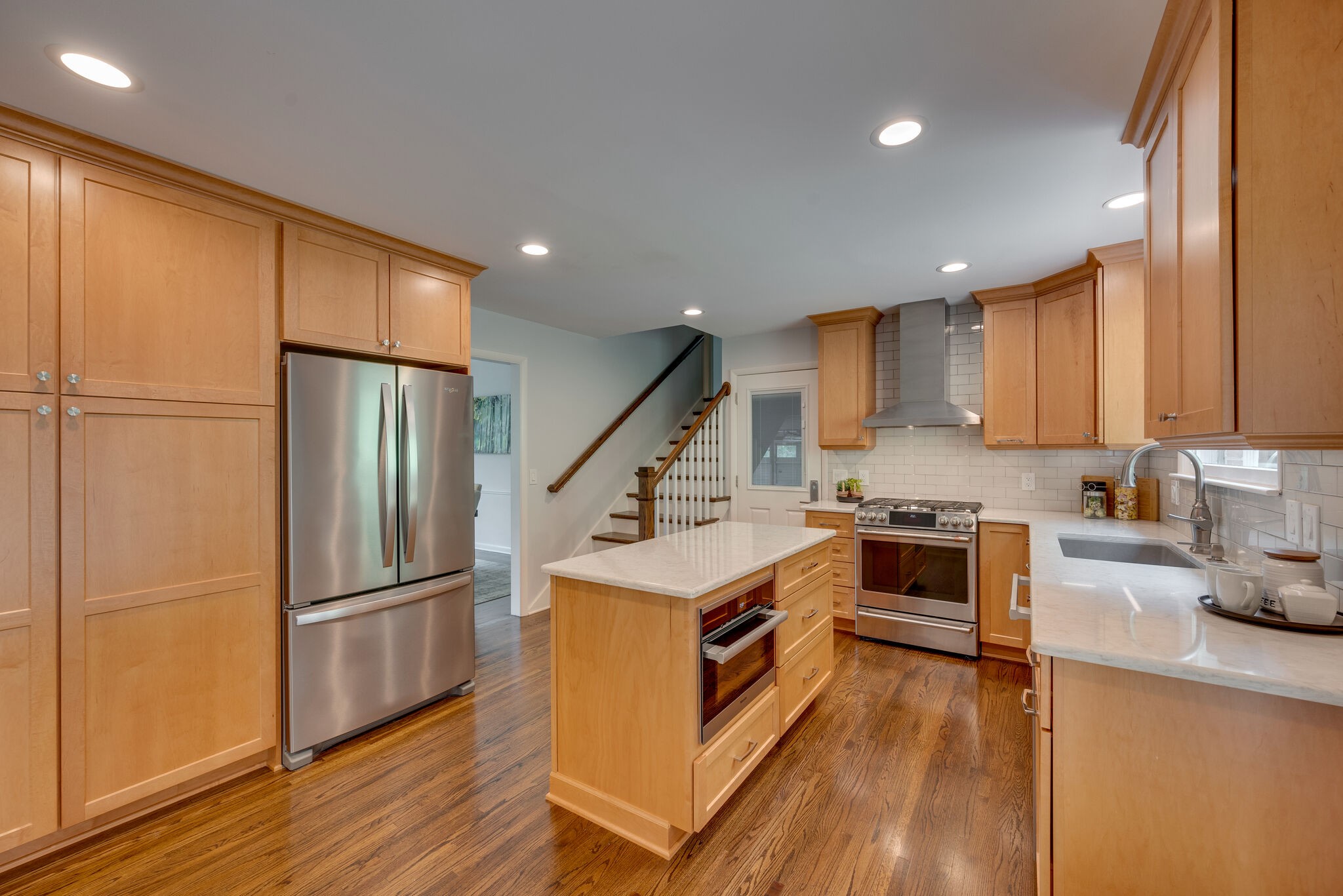 6612 Ellesmere Road Nashville, TN 37205 - Photo 9 of 34 a kitchen with stainless steel appliances granite countertop a refrigerator a stove a sink and a refrigerator