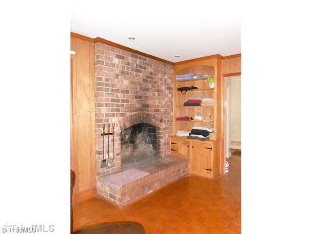2020 Huntington Road Burlington, NC 27215 - Photo 8 of 15 Den/Family/Great Room. den has woodburning FP and built in shelving & storage