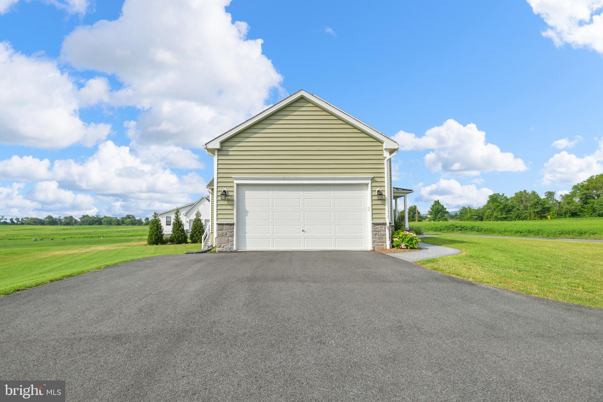 9813 Masser Road Frederick, MD 21702 - Photo 78 of 91 Side load garage w/ plenty of driveway parking...