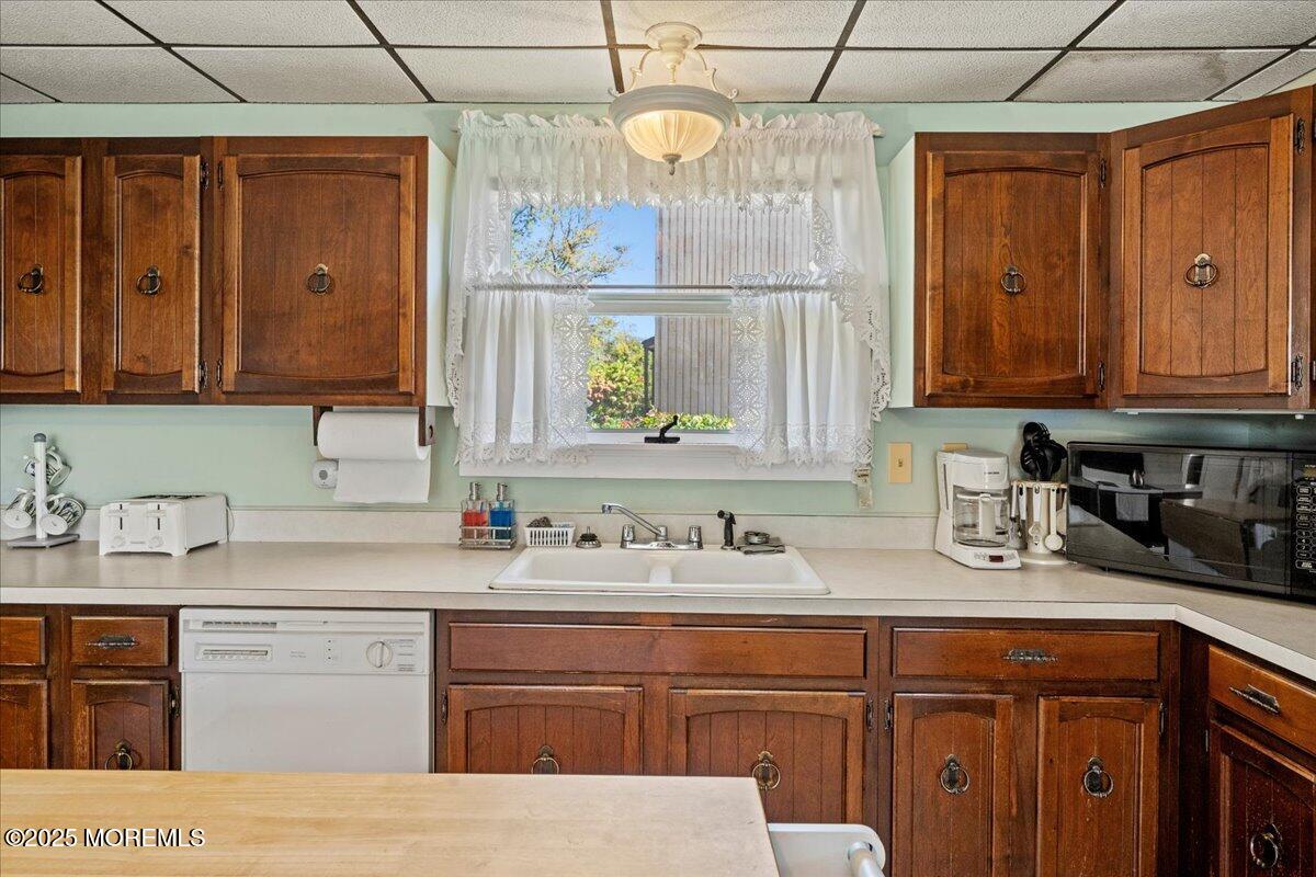418 Salem Avenue Spring Lake, NJ 07762 - Photo 12 of 29 a kitchen with a sink cabinets and window