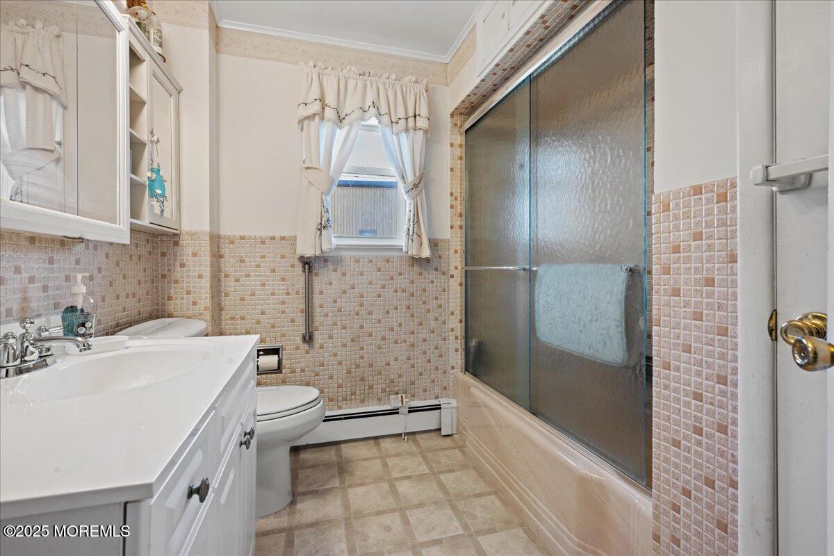 418 Salem Avenue Spring Lake, NJ 07762 - Photo 20 of 29 a bathroom with a sink toilet and shower