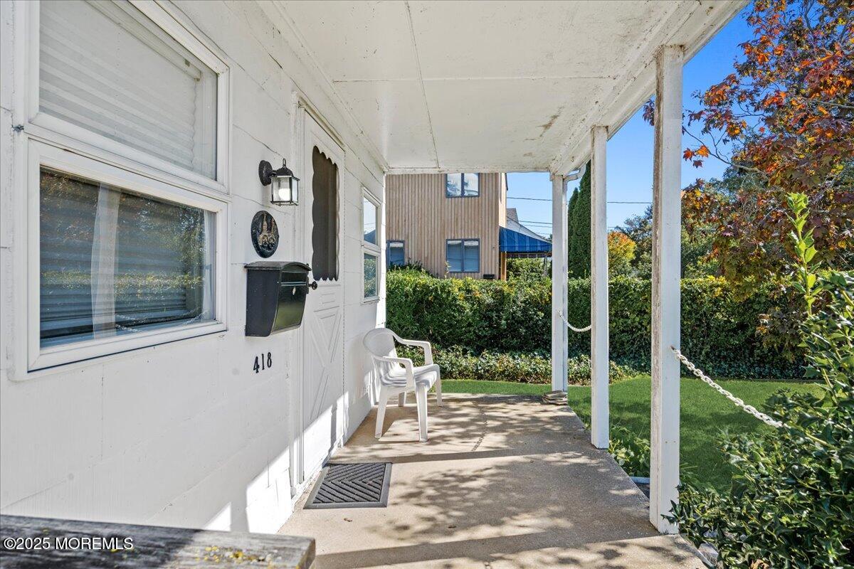 418 Salem Avenue Spring Lake, NJ 07762 - Photo 6 of 29 a front view of a house with a yard