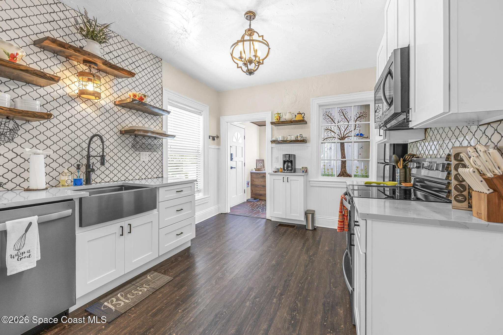 130 Valencia Road Rockledge, FL 32955 - Photo 19 of 68 Central Kitchen with Exterior Access