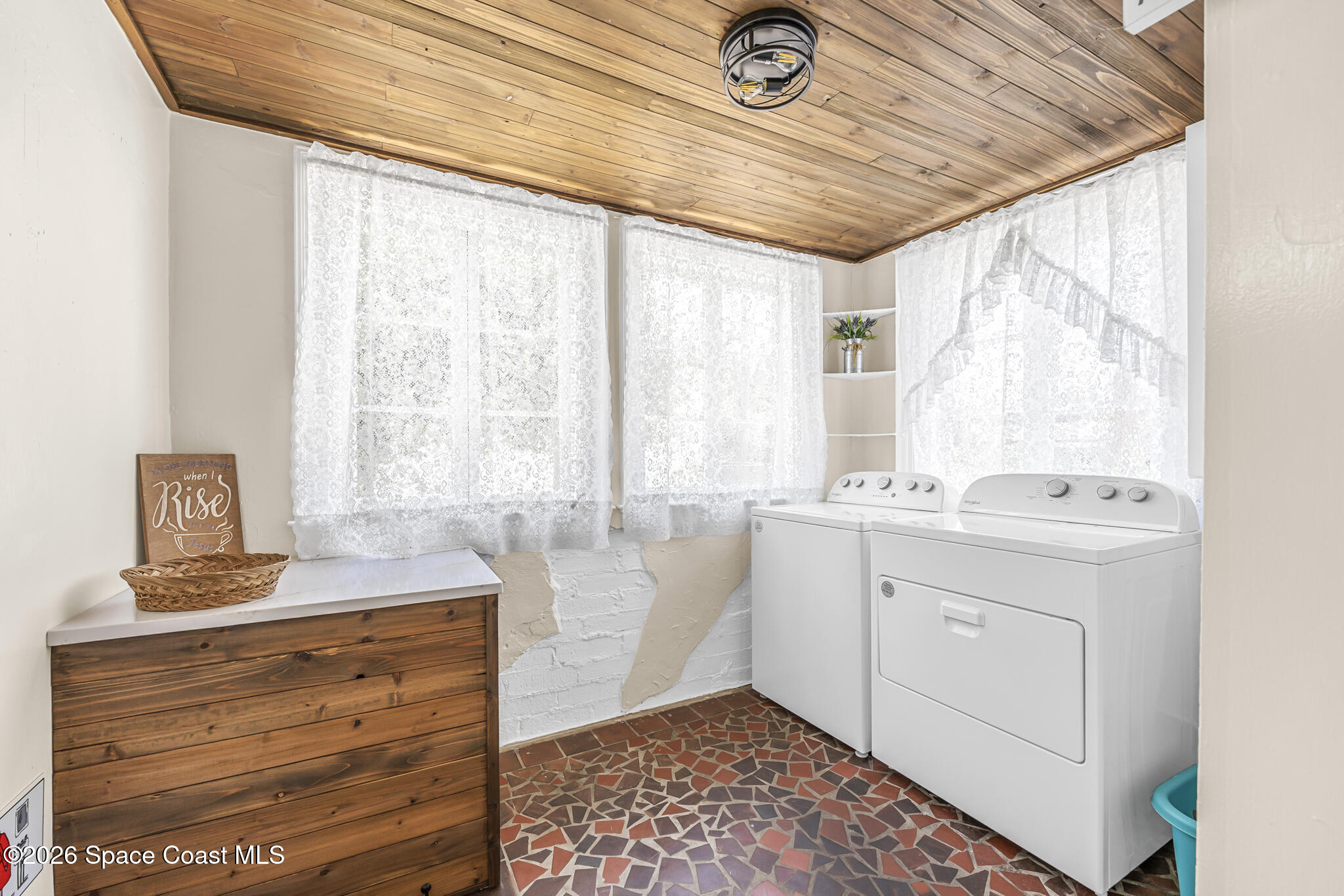 130 Valencia Road Rockledge, FL 32955 - Photo 22 of 68 Laundry w/ Exterior Access Off Kitchen