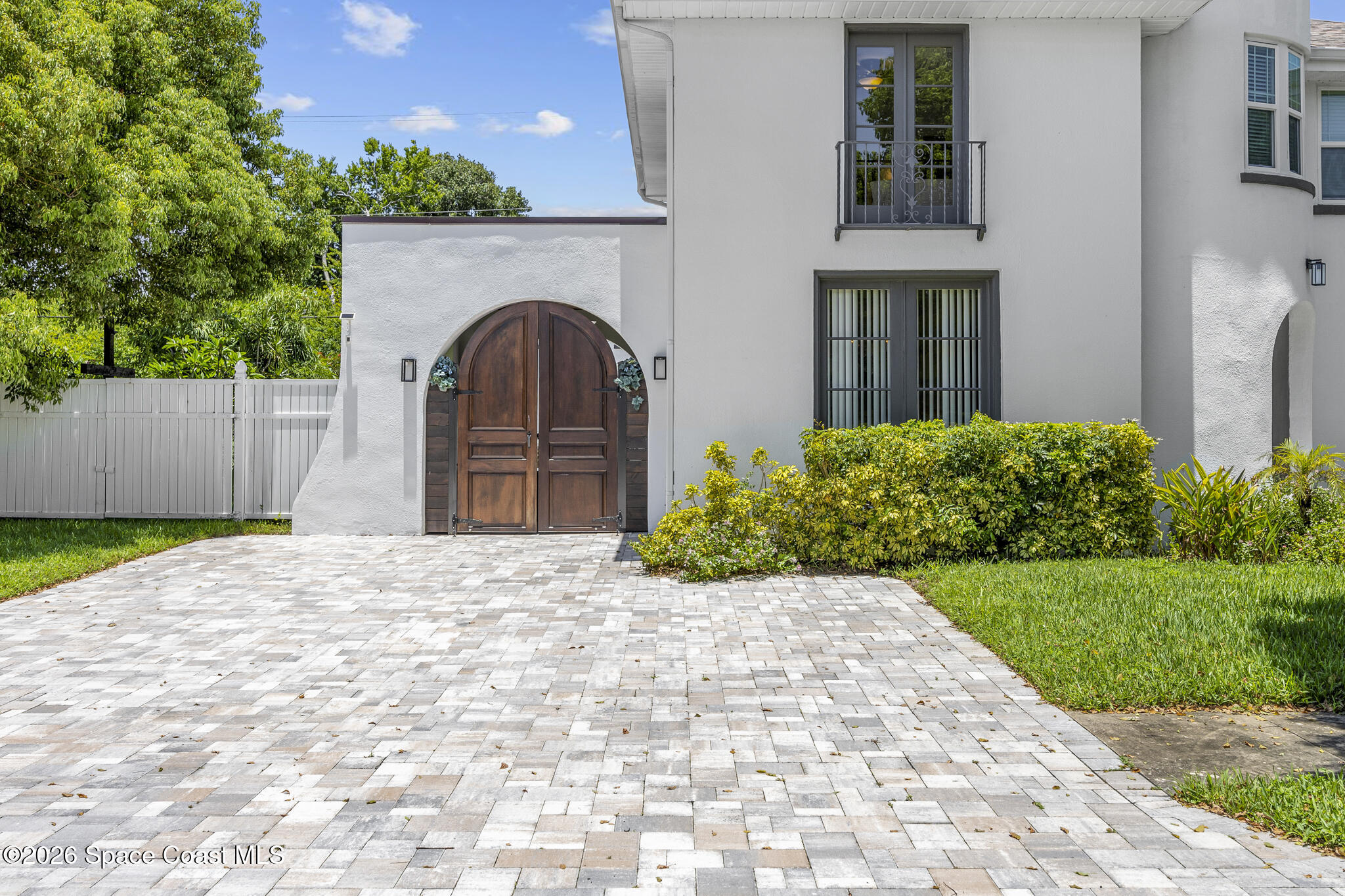 130 Valencia Road Rockledge, FL 32955 - Photo 6 of 68 Custom Oak Door Veranda Entry