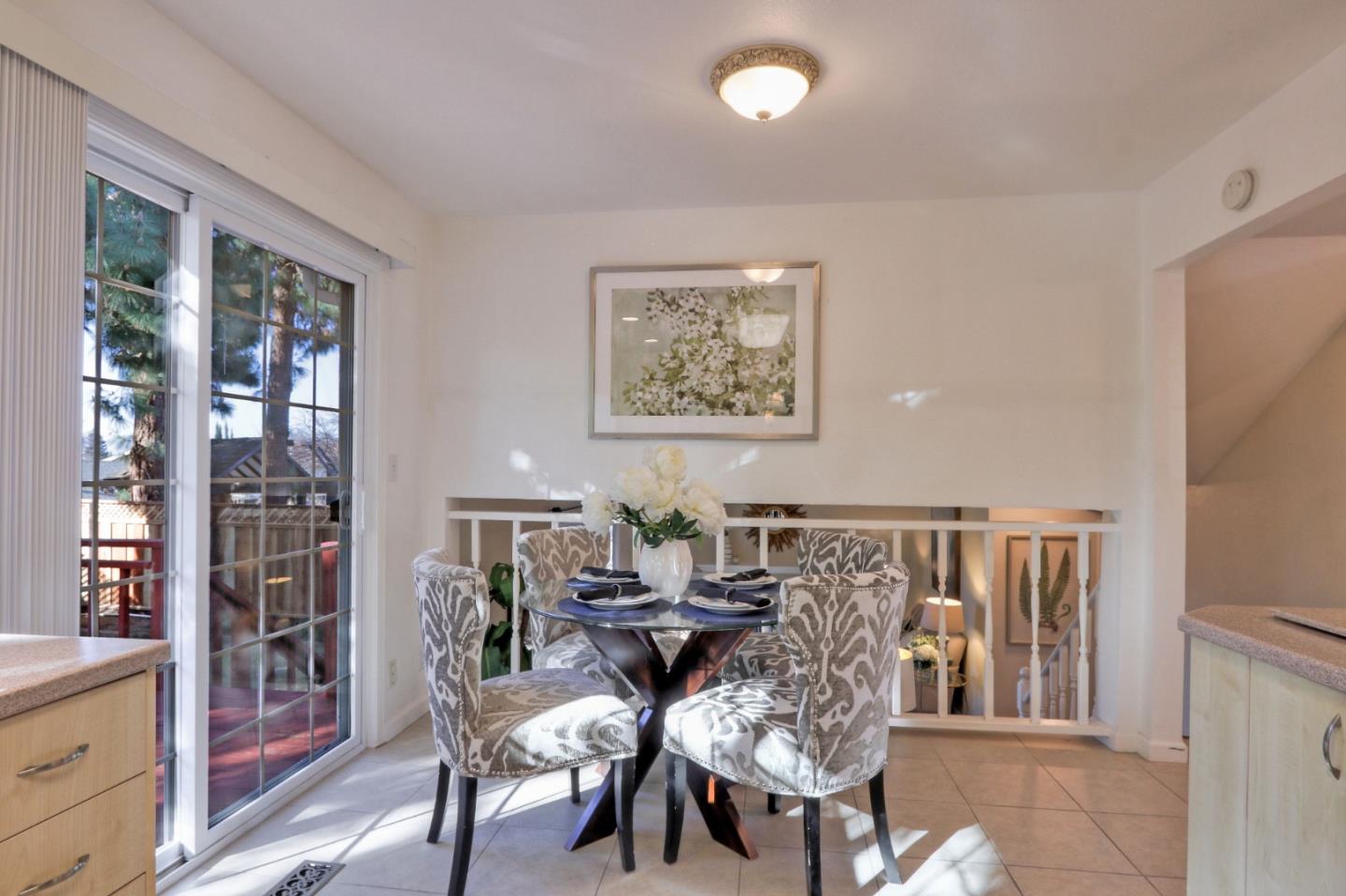2250 Yosemite Drive Milpitas, CA 95035 - Photo 17 of 43 a view of a dining room with furniture and window