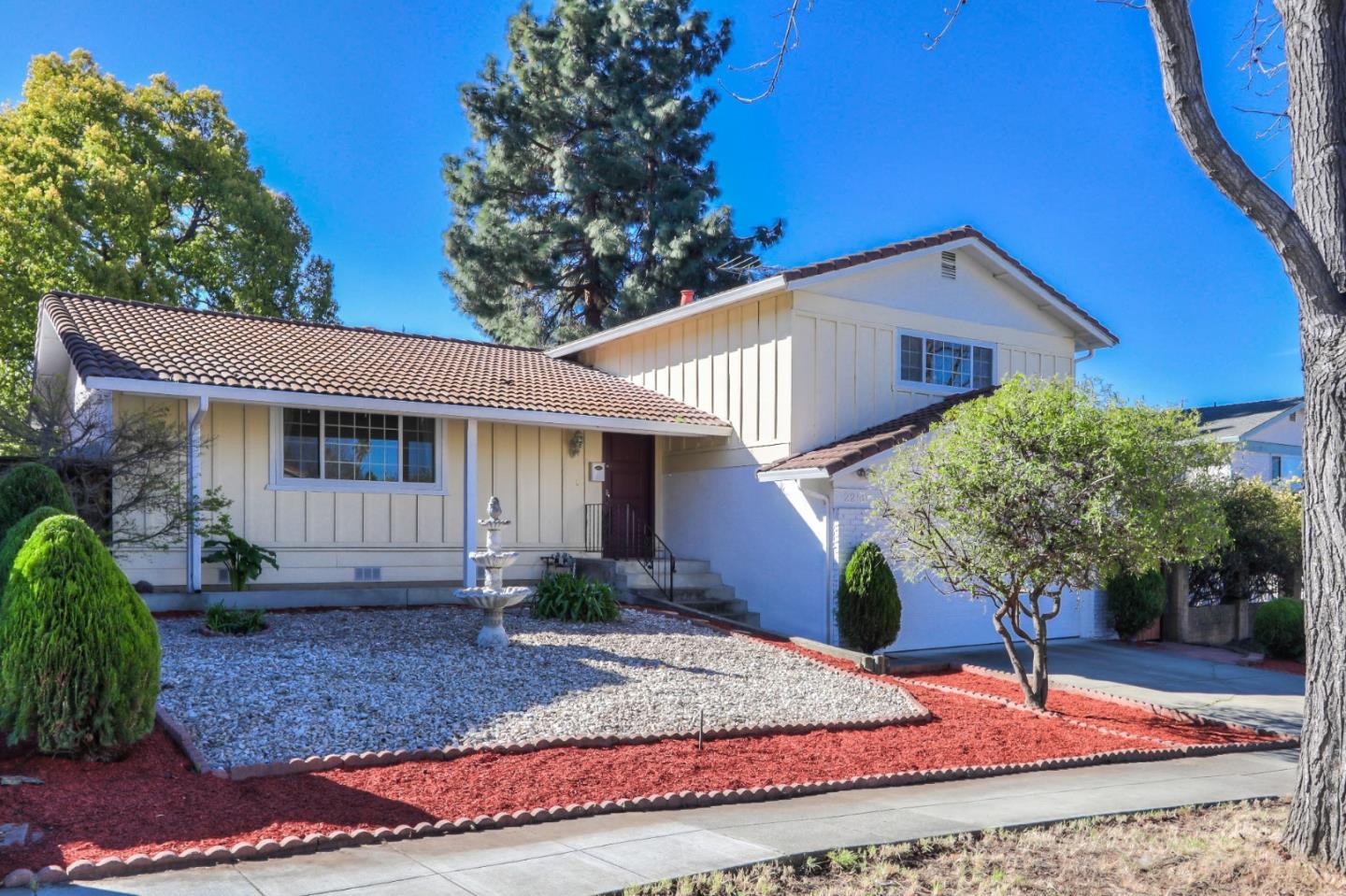 2250 Yosemite Drive Milpitas, CA 95035 - Photo 2 of 43 a front view of a house with garden