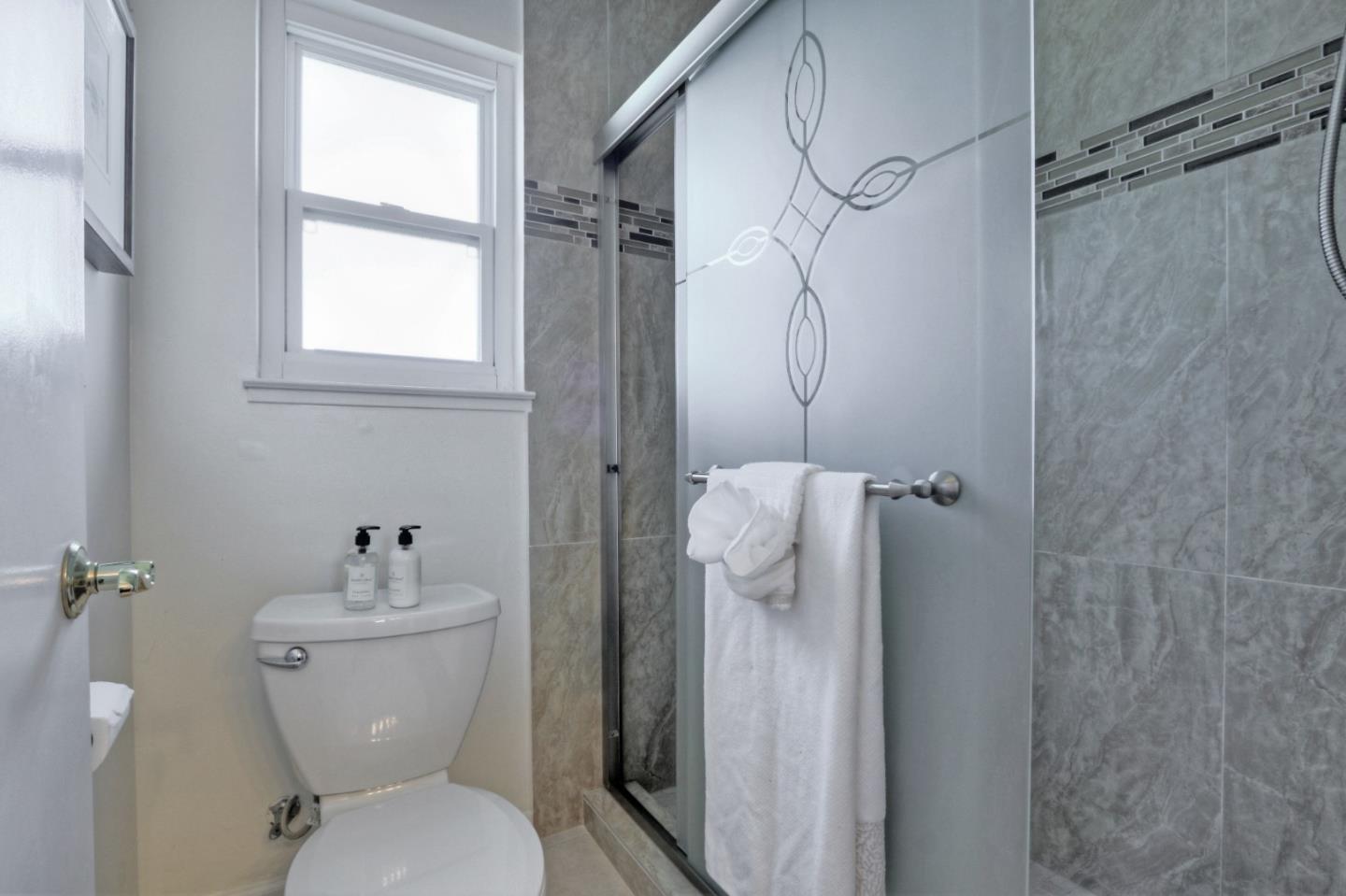 2250 Yosemite Drive Milpitas, CA 95035 - Photo 26 of 43 a bathroom with a toilet and shower