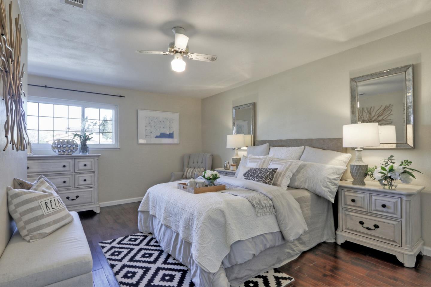 2250 Yosemite Drive Milpitas, CA 95035 - Photo 27 of 43 a bedroom with a bed and a dresser