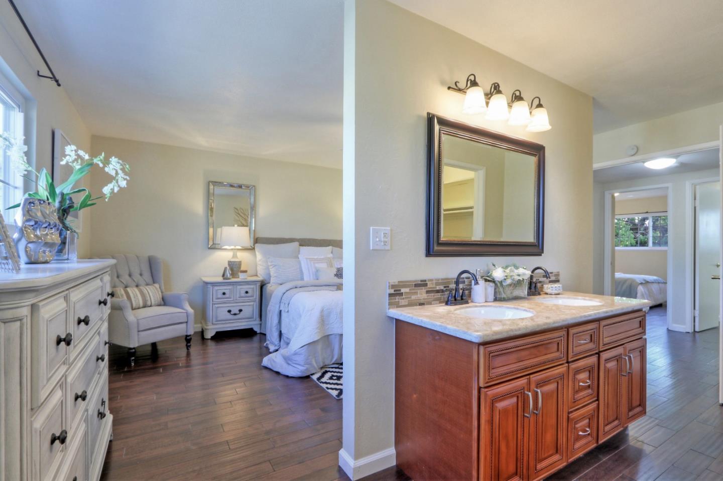 2250 Yosemite Drive Milpitas, CA 95035 - Photo 33 of 43 a spacious bathroom with double vanity sink a mirror a lamp and a window
