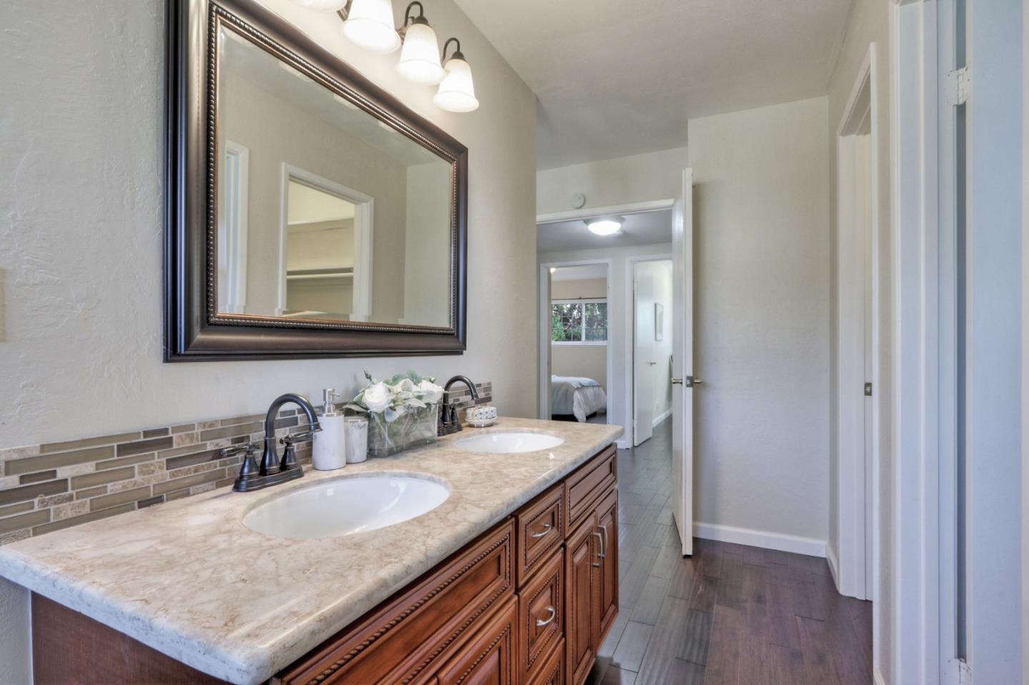 2250 Yosemite Drive Milpitas, CA 95035 - Photo 34 of 43 a bathroom with a sink double vanity and a mirror