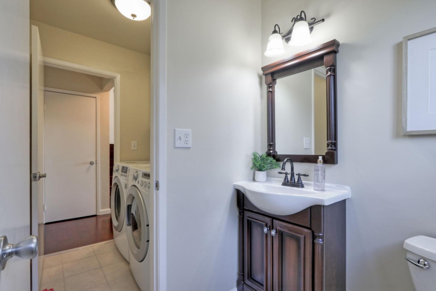 2250 Yosemite Drive Milpitas, CA 95035 - Photo 36 of 43 a bathroom with a sink and a mirror