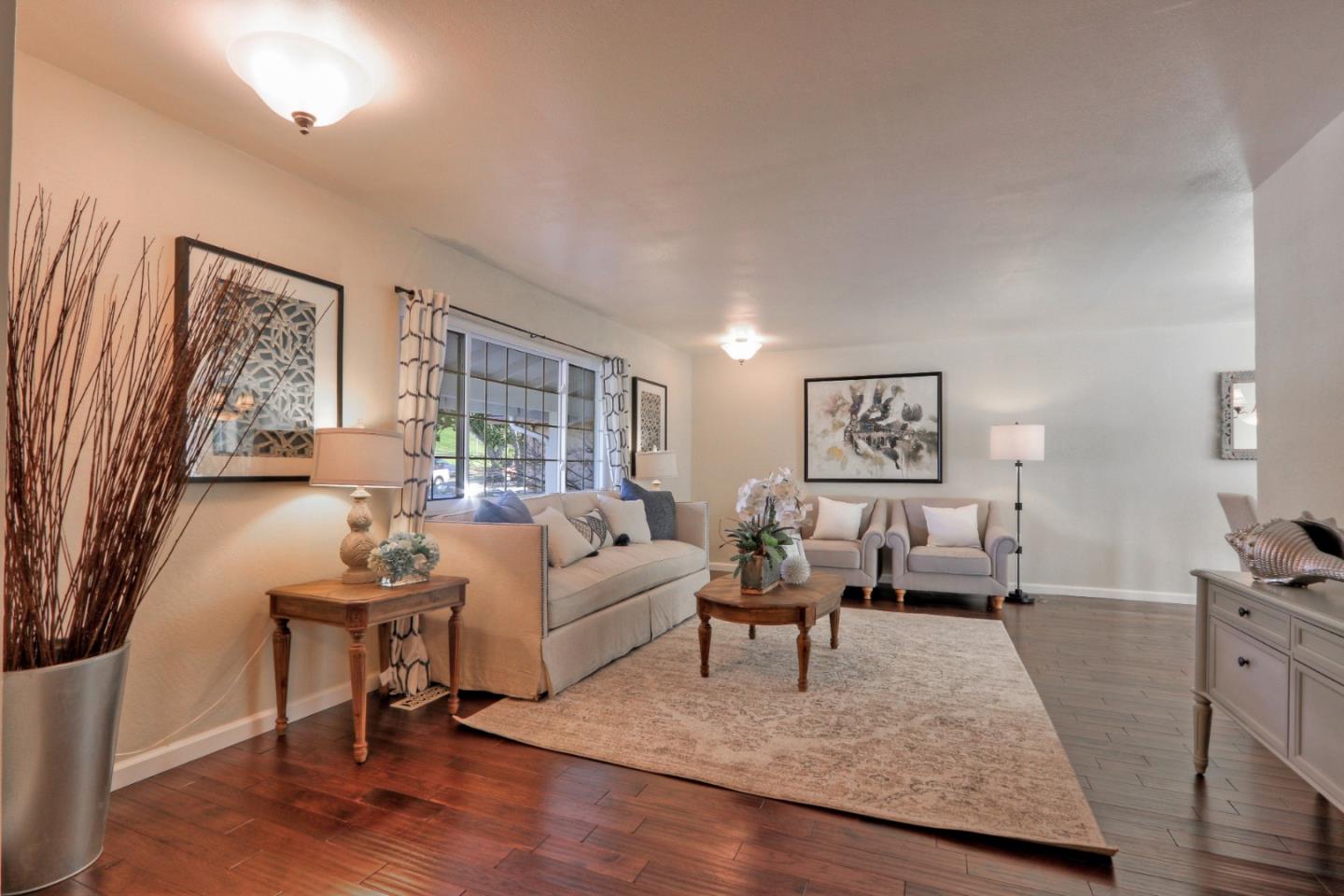 2250 Yosemite Drive Milpitas, CA 95035 - Photo 4 of 43 a living room with furniture and a couch