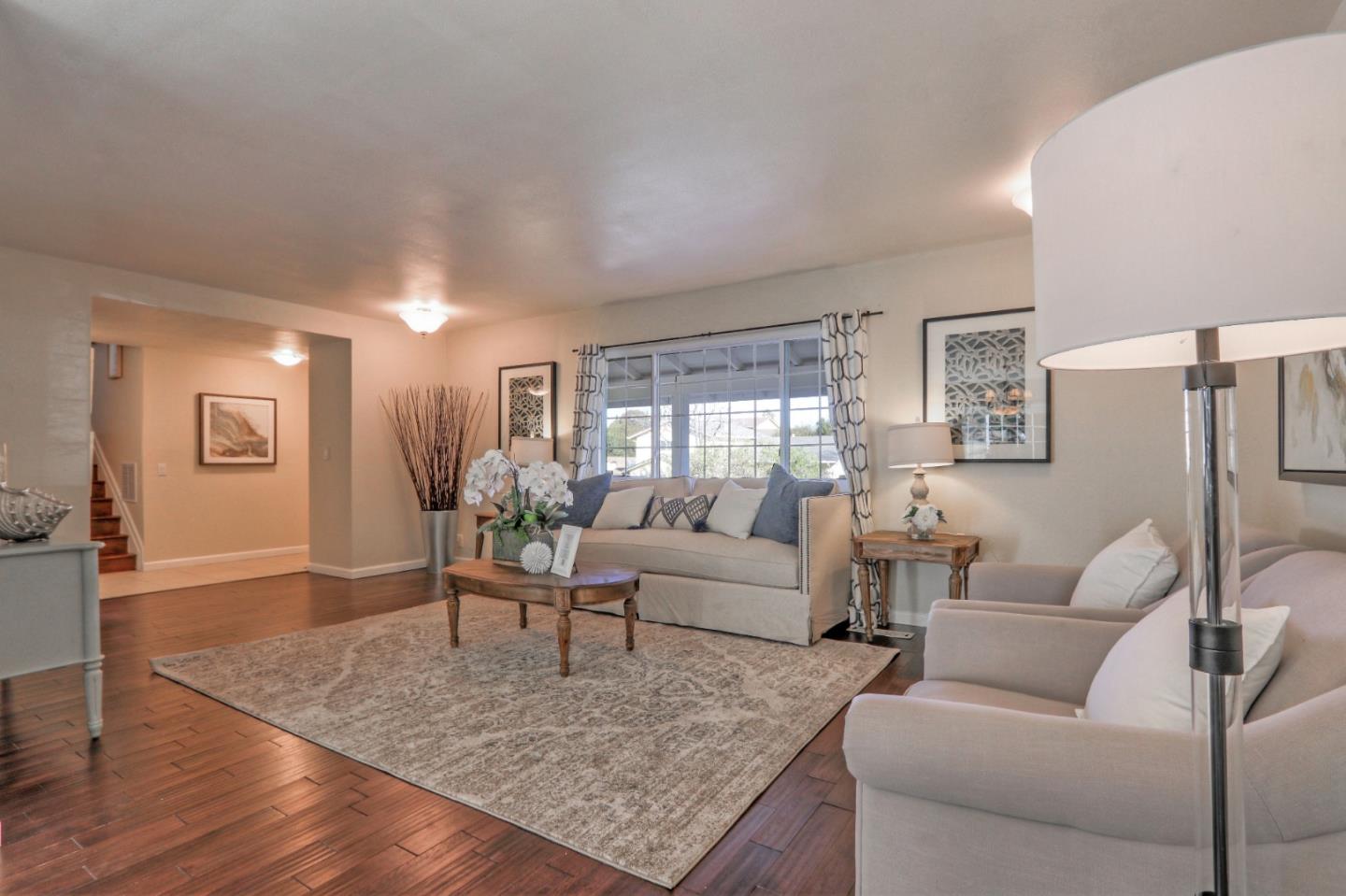 2250 Yosemite Drive Milpitas, CA 95035 - Photo 6 of 43 a living room with furniture and wooden floor