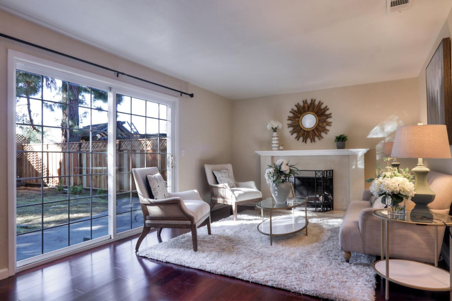 2250 Yosemite Drive Milpitas, CA 95035 - Photo 8 of 43 a living room with furniture and a fireplace