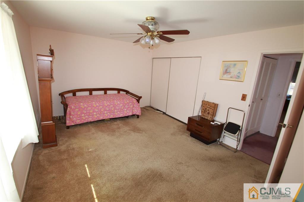 6605 Hana Road Edison, NJ 08817 - Photo 14 of 17 a living room with furniture