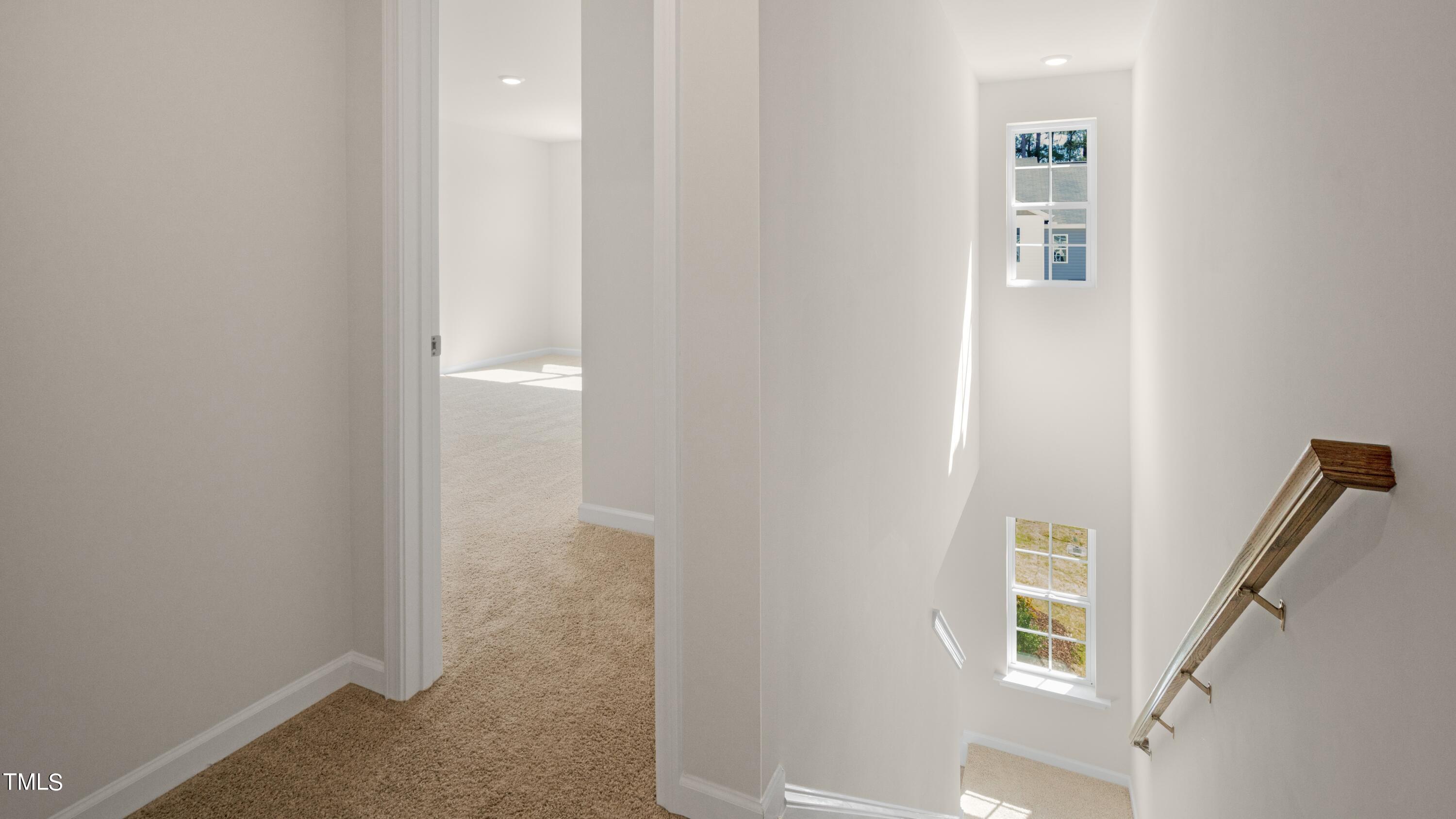 3202 Alibird Lane Carthage, NC 28327 - Photo 18 of 33 a view of a hallway with windows