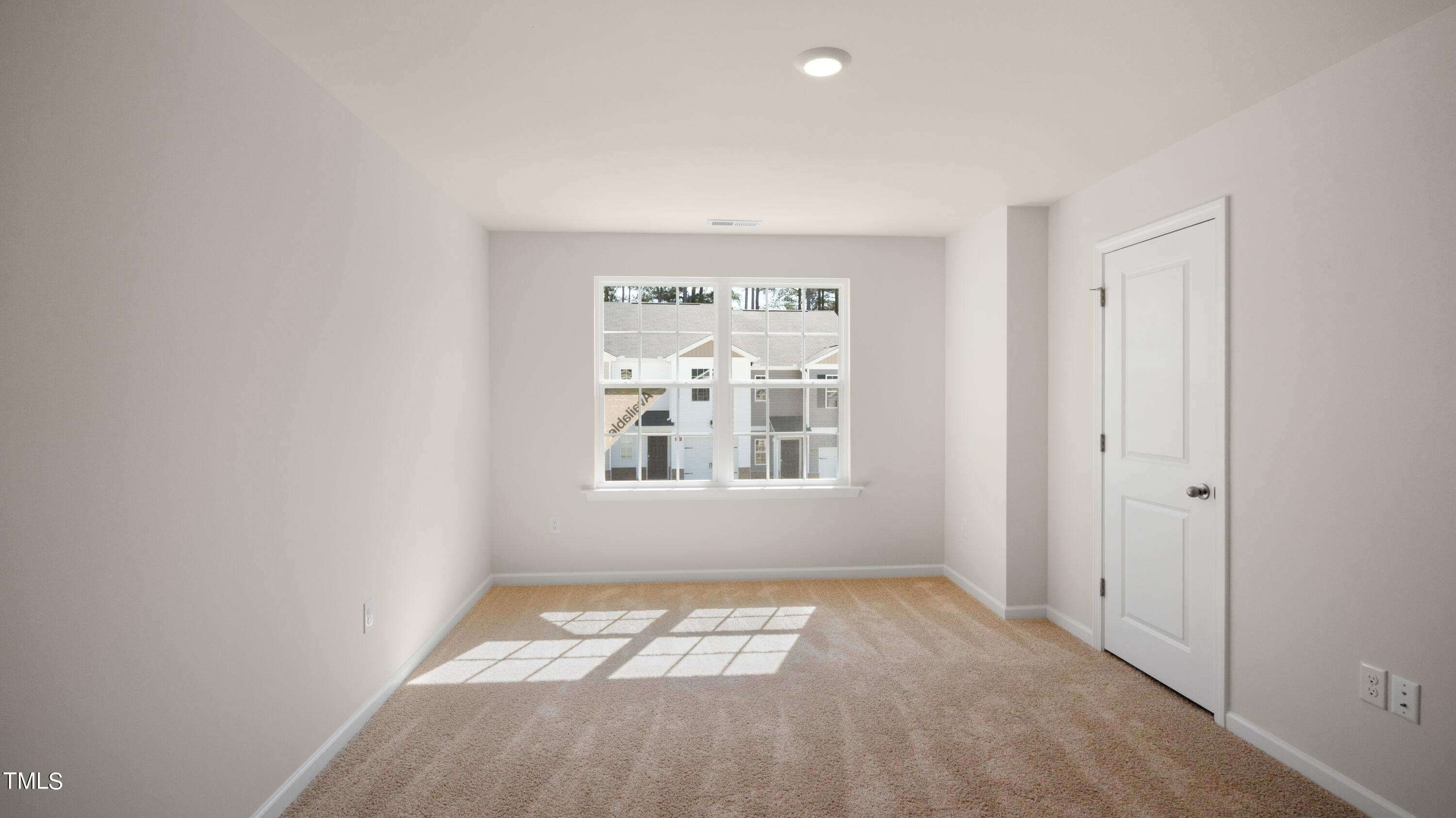 3202 Alibird Lane Carthage, NC 28327 - Photo 23 of 33 a view of an empty room with a window