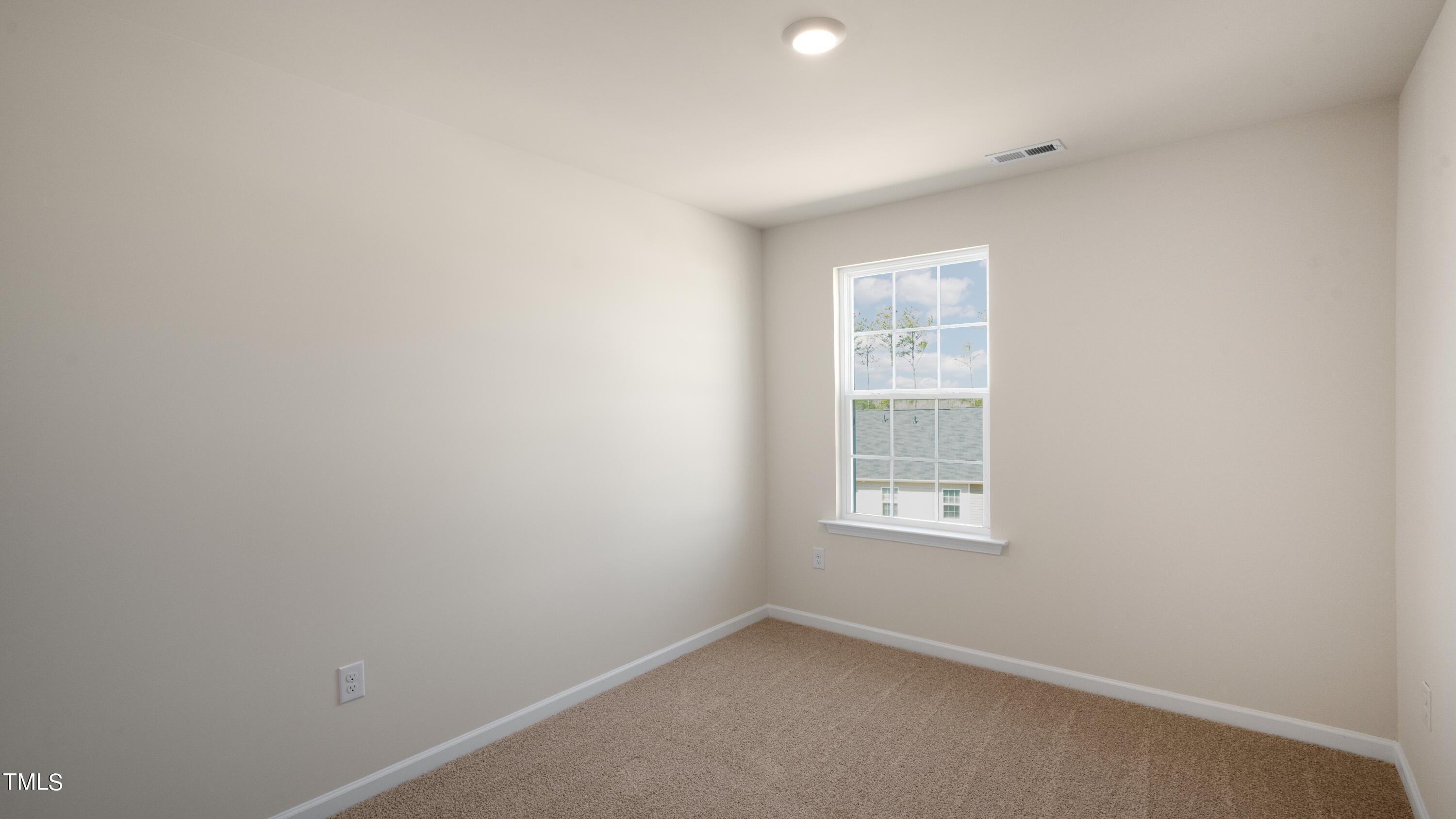 3202 Alibird Lane Carthage, NC 28327 - Photo 26 of 33 an empty room with a window