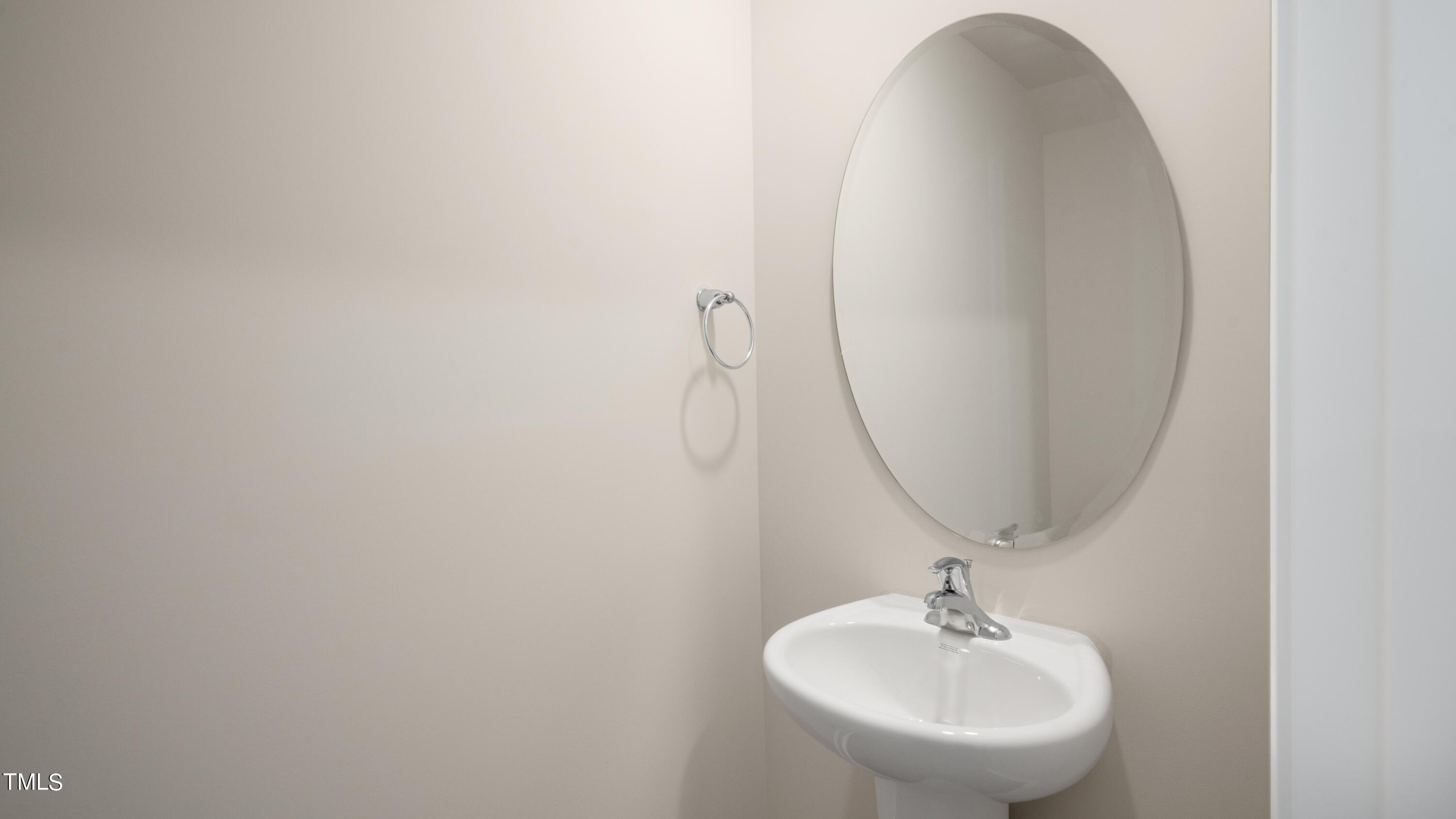 3202 Alibird Lane Carthage, NC 28327 - Photo 27 of 33 a bathroom with a sink and a mirror