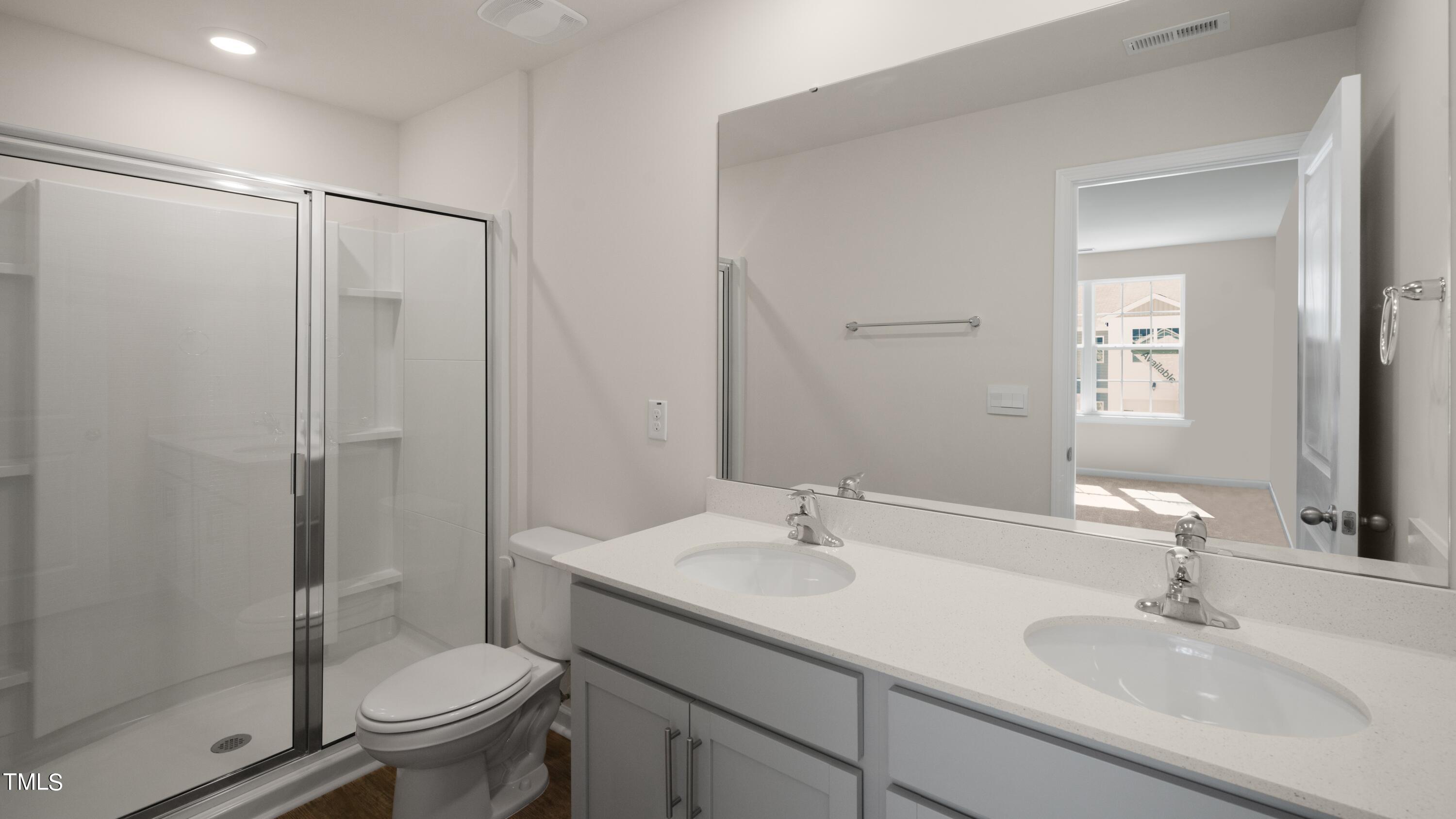 3202 Alibird Lane Carthage, NC 28327 - Photo 9 of 33 a bathroom with a sink toilet and shower
