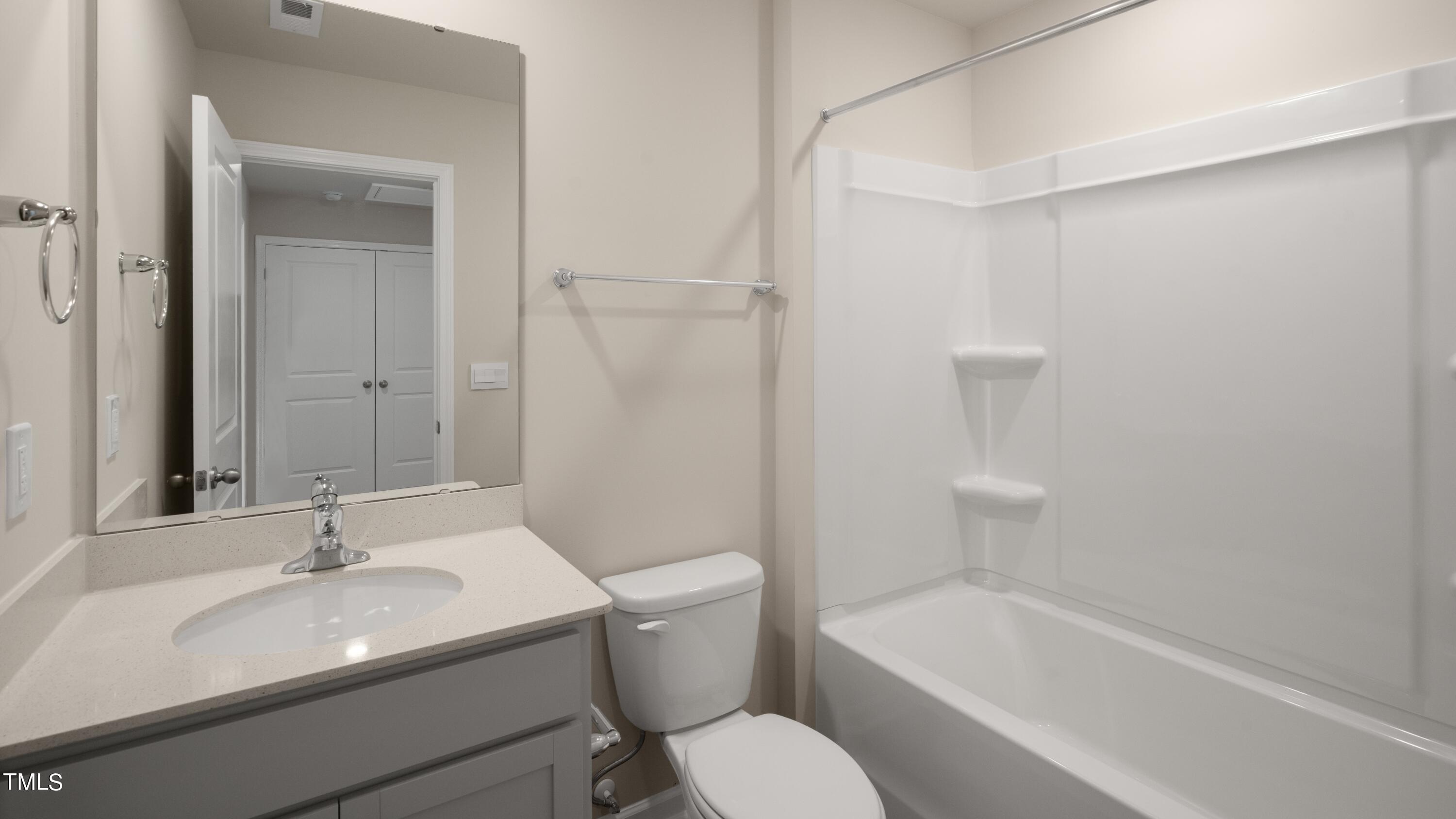 3202 Alibird Lane Carthage, NC 28327 - Photo 10 of 33 a bathroom with a sink toilet and shower