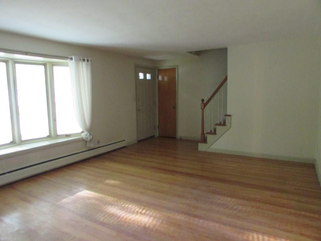 33 Irene Street Springfield, MA 01108 - Photo 14 of 35 a view of an empty room with a window