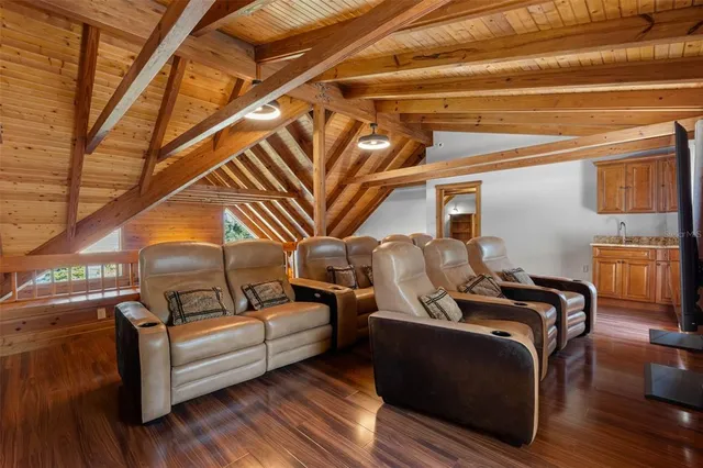 a large kitchen with a stove a sink dishwasher and a refrigerator