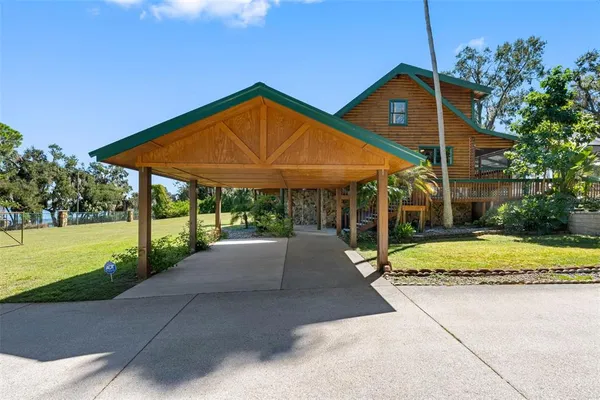 a front view of a house with swimming pool