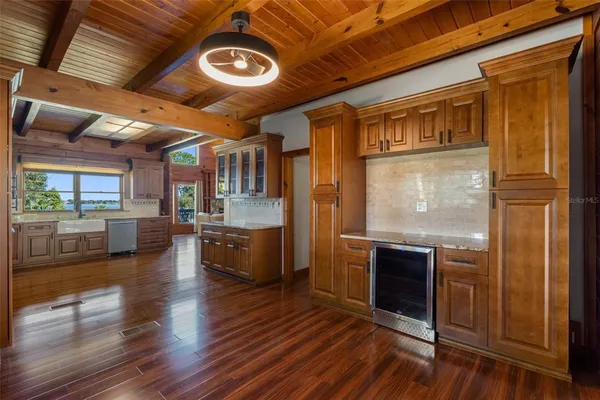 a view of porch with wooden floor