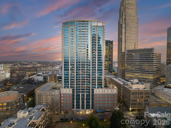 a view of a city with tall buildings