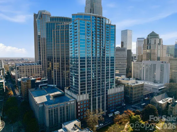 a view of city with tall buildings