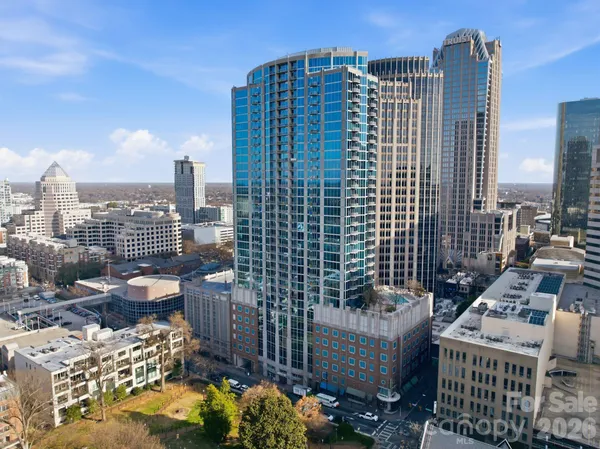 a view of a city with tall buildings