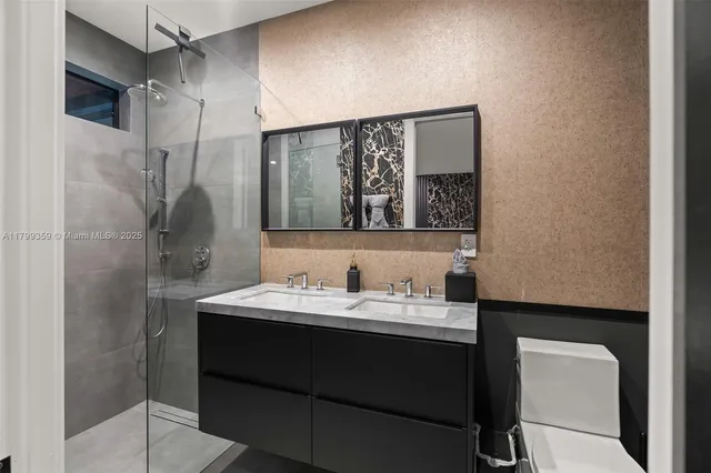 a bathroom with a sink and mirror