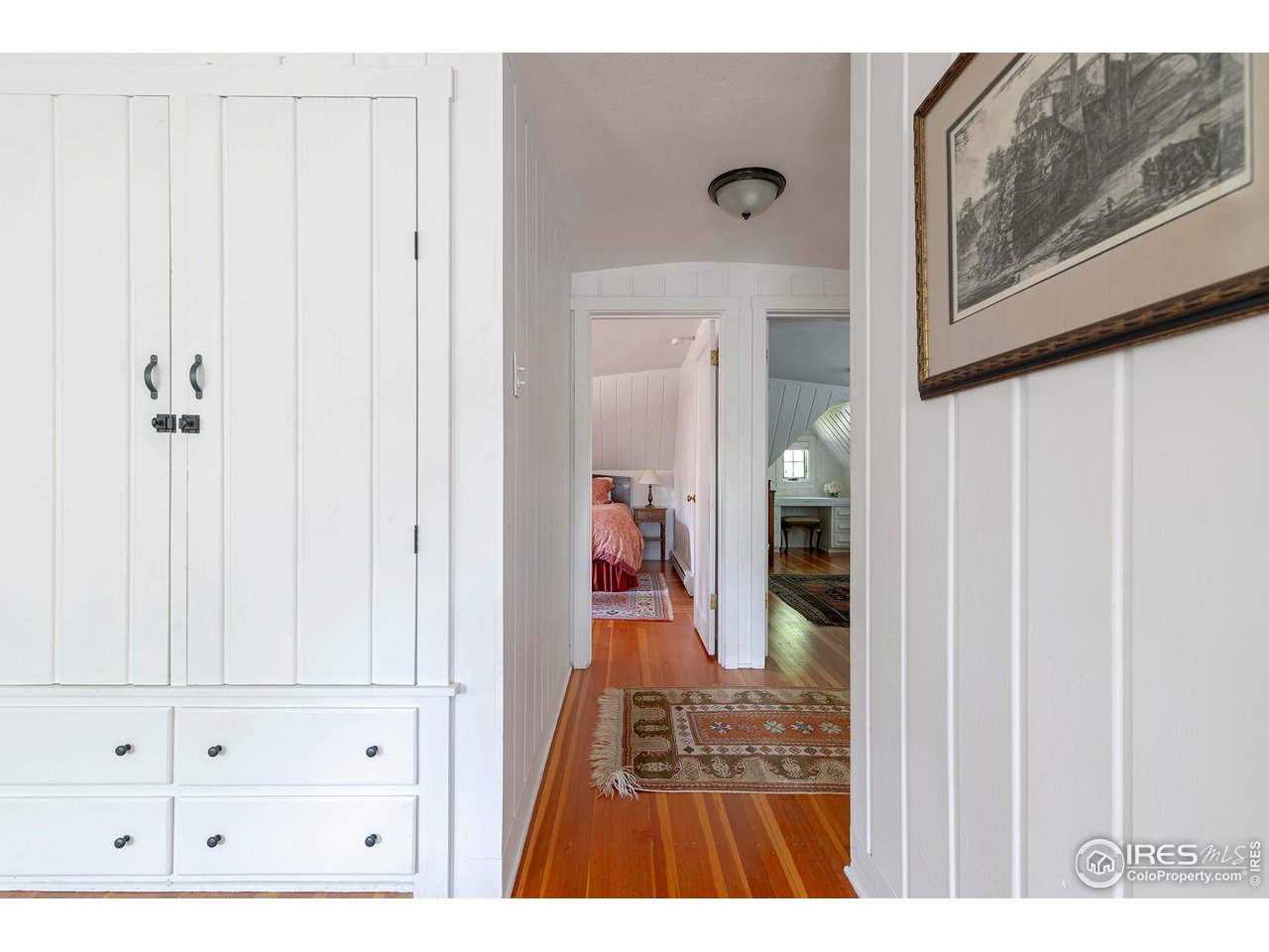 764 14th Street Boulder, CO 80302 - Photo 22 of 40 a view of a hallway with wooden floor