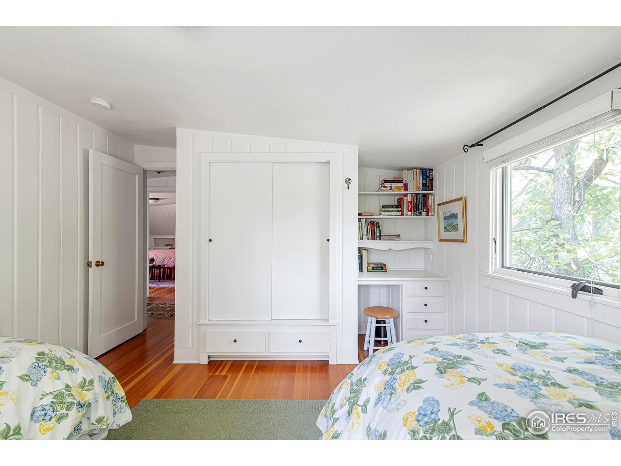 764 14th Street Boulder, CO 80302 - Photo 24 of 40 a bedroom with a bed and a window