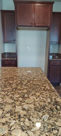 a room with cabinet and window