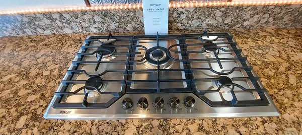 a bathroom with a toilet and a bathtub