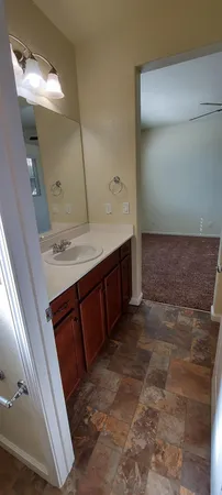 a large bathroom with a large tub