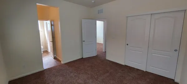 a bathroom with a sink toilet and mirror